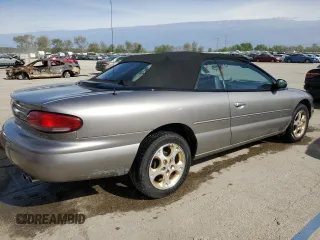 1998 Chrysler Sebring JXi z VIN 3C3EL55H7WT202665, wystawiony jako Copart lot #54619905 z przebiegiem 36 351 mil mil oraz Szkody całkowita. Historia ofert i sprzedaży dostępna na DreamBid. Obrazek 3.