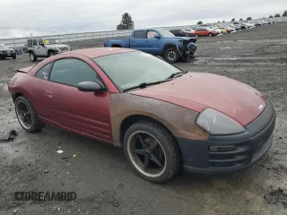 2000 Mitsubishi Eclipse RS with VIN 4A3AC34G9YE074744, listed as a Copart auction lot 41636195 with 183,083 mi miles and Salvage Title. Bid and sale history available at carsss.com. Image 4.