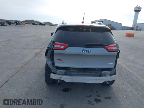 2014 Jeep Cherokee Latitude z VIN 1C4PJMCS8EW230213, wystawiony jako IAAI lot #42011183 z przebiegiem 133 299 mil mil oraz . Historia ofert i sprzedaży dostępna na DreamBid. Obrazek 6.