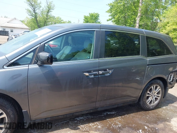 2012 Honda Odyssey EX-L with VIN 5FNRL5H67CB041252, listed as a IAAI auction lot 42158494 with 152,940 mi miles and . Bid and sale history available at DreamBid. Image 15.