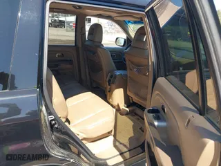 2005 Honda Pilot EX-L with RES with VIN 5FNYF18665B023730, listed as a IAAI auction lot 41989012 with 202,022 mi miles. Bid and sale history available at carsss.com. Image 8.
