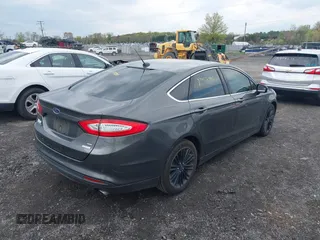 2016 Ford Fusion SE with VIN 3FA6P0HD4GR169113, listed as a IAAI auction lot 42037905 with 105,316 mi miles. Bid and sale history available at carsss.com. Image 4.