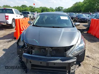 2017 Nissan Altima SV with VIN 1N4AL3AP5HC158441, listed as a IAAI auction lot 42147176 with 132,461 mi miles and . Bid and sale history available at DreamBid. Image 13.