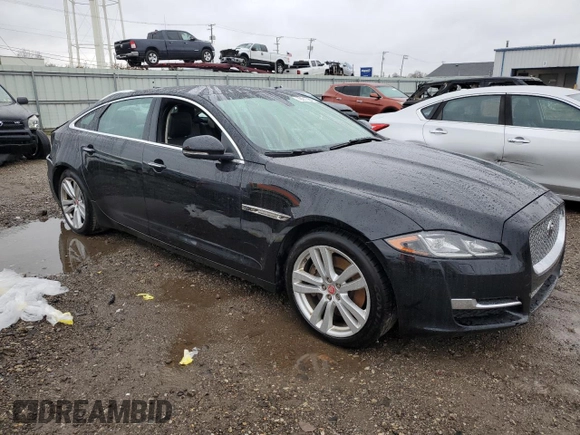 2016 Jaguar XJ Portfolio with VIN SAJWJ2GD8G8W02010, listed as a Copart auction lot 79011404 with Not Provided miles and Salvage Title. Bid and sale history available at DreamBid. Image 4.