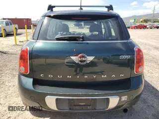 2014 MINI Countryman with VIN WMWZB3C51EWR40111, listed as a Copart auction lot 50274045 with 138,073 mi miles and Salvage title. Bid and sale history available at DreamBid. Image 6.