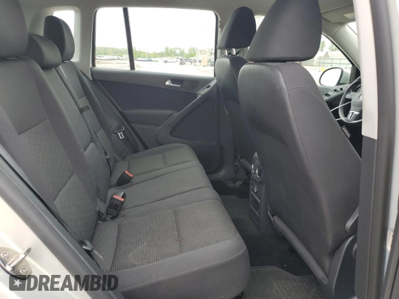 2014 Volkswagen Tiguan S z VIN WVGBV3AX8EW594957, wystawiony jako Copart lot #54565655 z przebiegiem 81 569 mil mil oraz Szkoda całkowita • Salvage title. Historia ofert i sprzedaży dostępna na DreamBid. Obrazek 11.