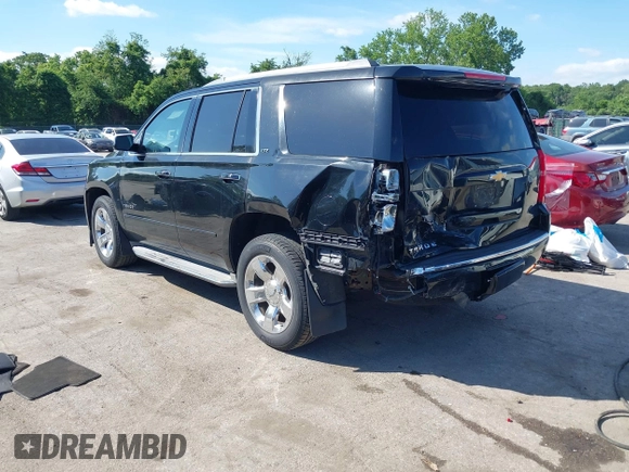 2015 Chevrolet Tahoe LTZ z VIN 1GNSKCKC3FR104845, wystawiony jako IAAI lot #42291785 z przebiegiem 75 047 mil mil oraz . Historia ofert i sprzedaży dostępna na DreamBid. Obrazek 3.