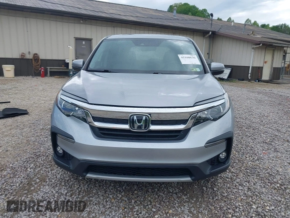 2021 Honda Pilot EX-L with VIN 5FNYF6H50MB063465, listed as a IAAI auction lot 42160636 with 28,595 mi miles and . Bid and sale history available at DreamBid. Image 12.