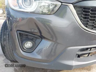 2014 Mazda CX-5 Grand Touring with VIN JM3KE2DY7E0345742, listed as a IAAI auction lot 41864116 with 158,746 mi miles. Bid and sale history available at carsss.com. Image 6.