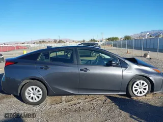 2020 Toyota Prius L Eco with VIN JTDKARFU2L3120891, listed as a IAAI auction lot 41318597 with 79,848 mi miles. Bid and sale history available at carsss.com. Image 13.