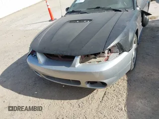 2004 Ford Mustang Deluxe with VIN 1FAFP44624F133914, listed as a IAAI auction lot 41699614 with 170,650 mi miles. Bid and sale history available at carsss.com. Image 6.