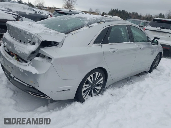 2014 Lincoln MKZ z VIN 3LN6L2JK9ER813109, wystawiony jako IAAI lot #41444866 z przebiegiem 128 613 mil mil oraz . Historia ofert i sprzedaży dostępna na DreamBid. Obrazek 4.
