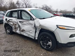 2014 Jeep Cherokee Sport with VIN 1C4PJMAB3EW287020, listed as a IAAI auction lot 41040643 with 134,417 mi miles. Bid and sale history available at carsss.com. Image 18.