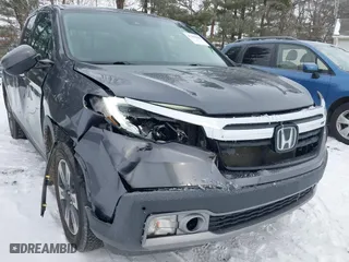 2017 Honda Ridgeline RTL-E with VIN 5FPYK3F75HB035253, listed as a IAAI auction lot 41292668 with 115,581 mi miles. Bid and sale history available at carsss.com. Image 6.