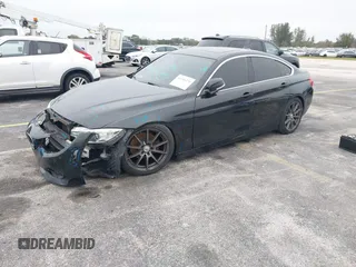2016 BMW 4 Series 428i xDrive with VIN WBA4C9C58GG136248, listed as a IAAI auction lot 41346270 with 129,464 mi miles and . Bid and sale history available at carsss.com. Image 2.