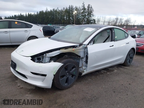 2021 Tesla Model 3 Long Range with VIN 5YJ3E1EB3MF856009, listed as a IAAI auction lot 41809767 with 42,072 mi miles. Bid and sale history available at carsss.com. Image 2.