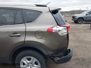 2015 Toyota RAV4 LE with VIN 2T3BFREV1FW245801, listed as a IAAI auction lot 42039074 with 129,181 mi miles. Bid and sale history available at carsss.com. Image 18.