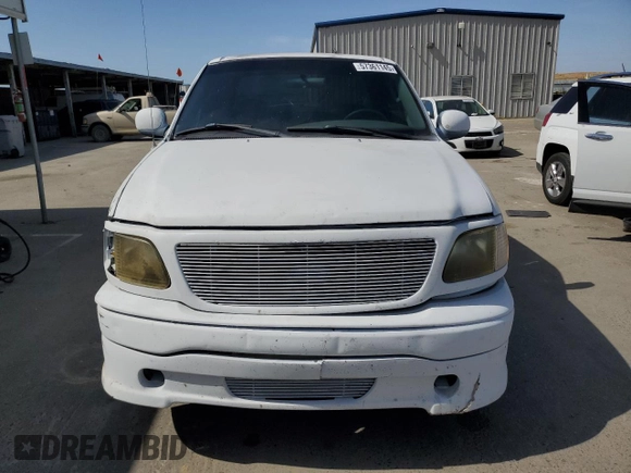 2003 Ford F-150 XL z VIN 2FTRX17253CA75533, wystawiony jako Copart lot #57361145 z przebiegiem 220 482 mil mil oraz Szkoda całkowita • Salvage title. Historia ofert i sprzedaży dostępna na DreamBid. Obrazek 5.