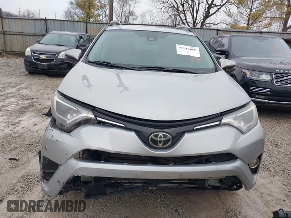 2018 Toyota RAV4 XLE with VIN 2T3RFREV1JW842728, listed as a IAAI auction lot 41519668 with 149,670 mi miles. Bid and sale history available at carsss.com. Image 12.