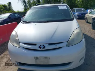 2009 Toyota Sienna XLE with VIN 5TDZK22C19S262107, listed as a IAAI auction lot 42158864 with 186,711 mi miles. Bid and sale history available at carsss.com. Image 6.