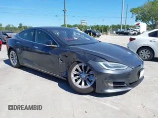 2016 Tesla Model S 70 kWh Battery with VIN 5YJSA1E14GF149746, listed as a IAAI auction lot 41846550 with 62,860 mi miles. Bid and sale history available at carsss.com. Image 1.