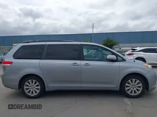 2014 Toyota Sienna LE with VIN 5TDJK3DC1ES080711, listed as a IAAI auction lot 41910679 with 118,788 mi miles and . Bid and sale history available at DreamBid. Image 13.
