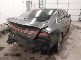 2015 Lincoln MKZ Hybrid z VIN 3LN6L2LU0FR624283, wystawiony jako IAAI lot #41402447 z przebiegiem 79 883 mil mil oraz . Historia ofert i sprzedaży dostępna na DreamBid. Obrazek 4.
