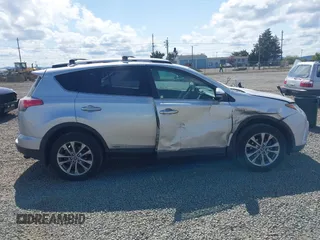 2016 Toyota RAV4 Limited with VIN JTMDJREVXGD030438, listed as a IAAI auction lot 42189476 with 106,366 mi miles and . Bid and sale history available at DreamBid. Image 13.