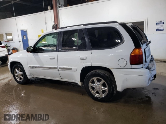 2005 GMC Envoy SLE z VIN 1GKDT13S452360609, wystawiony jako Copart lot #56188495 z przebiegiem 180 046 mil mil oraz Szkoda całkowita • Salvage title. Historia ofert i sprzedaży dostępna na DreamBid. Obrazek 2.