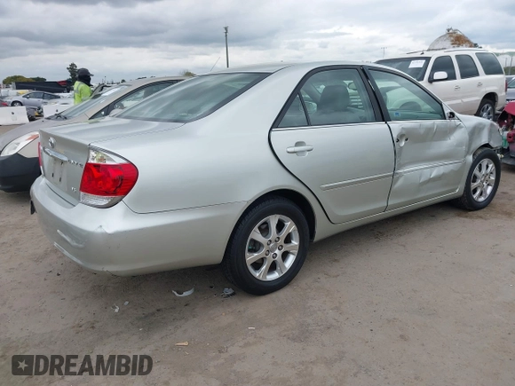 2005 Toyota Camry LE with VIN JTDBF30K650163057, listed as a IAAI auction lot 41730270 with 98,300 mi miles and . Bid and sale history available at DreamBid. Image 4.