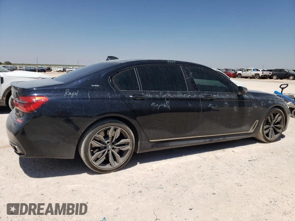 2018 BMW 7 Series M760i xDrive with VIN WBA7H6C51JG614580, listed as a Copart auction lot 65748304 with 46,801 mi miles and Clean Title. Bid and sale history available at carsss.com. Image 3.