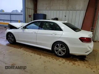2014 Mercedes-Benz E 400 Sport with VIN WDDHF9FBXEA936424, listed as a Copart auction lot 83331224 with 194,689 mi miles and Salvage Title. Bid and sale history available at DreamBid. Image 2.