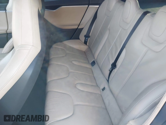 2013 Tesla Model S с VIN 5YJSA1DN9DFP06165, выставлен на аукционе IAAI как лот 40920844 с пробегом 181 342 миль миль и . История ставок и продаж доступна на DreamBid. Изображение 8.