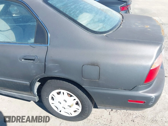1997 Honda Accord Value with VIN 1HGCD5689VA182425, listed as a IAAI auction lot 41702660 with 208,005 mi miles and . Bid and sale history available at carsss.com. Image 6.