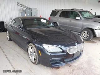 2012 BMW 6 Series 650i with VIN WBALX3C51CDV77602, listed as a IAAI auction lot 41668235 with 103,684 mi miles. Bid and sale history available at carsss.com. Image 1.