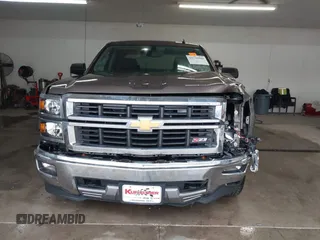 2014 Chevrolet Silverado 1500 LT with VIN 1GCVKREC5EZ147506, listed as a IAAI auction lot 41736960 with 112,399 mi miles and . Bid and sale history available at DreamBid. Image 13.