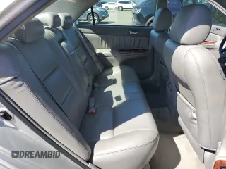 2006 Toyota Camry LE z VIN 4T1BF30KX6U630387, wystawiony jako Copart lot #49624755 z przebiegiem 232 568 mil mil oraz Szkoda całkowita • Salvage title. Historia ofert i sprzedaży dostępna na DreamBid. Obrazek 10.