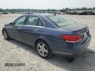 2015 Mercedes-Benz E 350 Luxury with VIN WDDHF8JB5FB165755, listed as a Copart auction lot 56584505 with 102,701 mi miles and Salvage title. Bid and sale history available at DreamBid. Image 2.