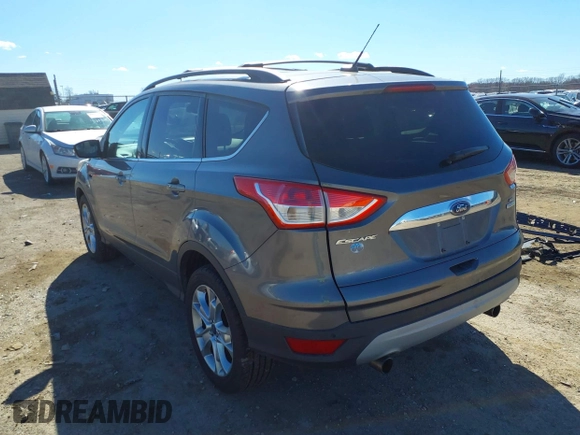 2013 Ford Escape SEL with VIN 1FMCU0HX2DUA51416, listed as a IAAI auction lot 41689474 with 140,596 mi miles and . Bid and sale history available at DreamBid. Image 3.