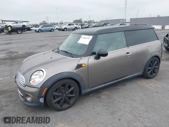 2013 MINI Clubman z VIN WMWZF3C56DT490749, wystawiony jako IAAI lot #42368888 z przebiegiem 163 731 mil mil oraz . Historia ofert i sprzedaży dostępna na DreamBid. Obrazek 2.