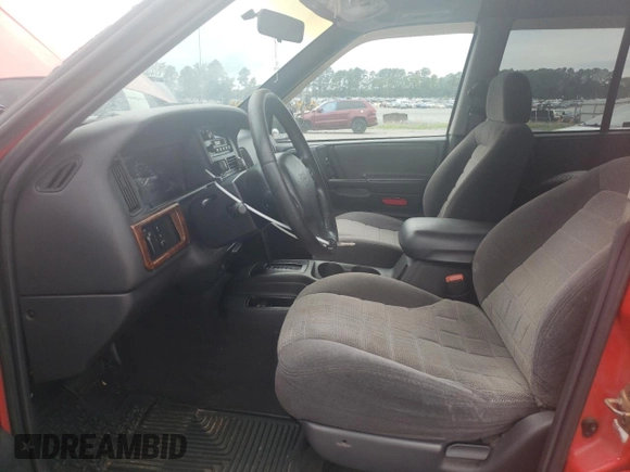 1998 Jeep Grand Cherokee Laredo with VIN 1J4FX58S3WC144684, listed as a Copart auction lot 67226694 with 106,602 mi miles and Clean Title. Bid and sale history available at carsss.com. Image 7.