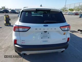 2021 Ford Escape SE Hybrid with VIN 1FMCU9BZ4MUA68247, listed as a IAAI auction lot 42353179 with 132,651 mi miles and . Bid and sale history available at DreamBid. Image 16.