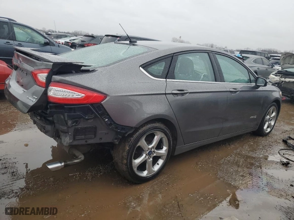 2014 Ford Fusion SE Hybrid with VIN 3FA6P0LU4ER327597, listed as a Copart auction lot 47888085 with 130,874 mi miles and Salvage Title. Bid and sale history available at carsss.com. Image 3.