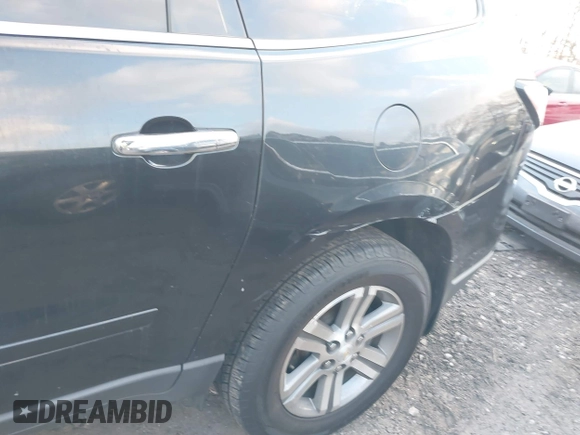 2015 Chevrolet Traverse LT with VIN 1GNKVHKD0FJ205756, listed as a IAAI auction lot 41047352 with Not Provided miles and . Bid and sale history available at DreamBid. Image 6.