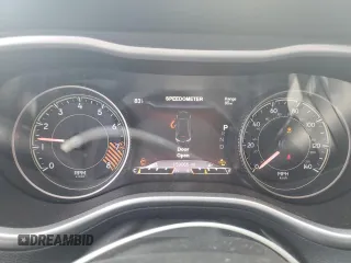 2014 Jeep Cherokee Trailhawk z VIN 1C4PJMBS7EW236960, wystawiony jako Copart lot #57098695 z przebiegiem 159 065 mil mil oraz Czysty tytuł • Clean title. Historia ofert i sprzedaży dostępna na DreamBid. Obrazek 9.