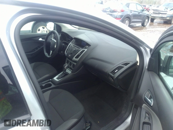 2013 Ford Focus SE with VIN 1FADP3F25DL271105, listed as a IAAI auction lot 36260870 with 122,592 mi miles. Bid and sale history available at carsss.com. Image 5.