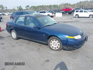 2001 Saturn LS z VIN 1G8JU54F01Y586927, wystawiony jako IAAI lot #41766426 z przebiegiem 279 698 mil mil oraz . Historia ofert i sprzedaży dostępna na DreamBid. Obrazek 1.
