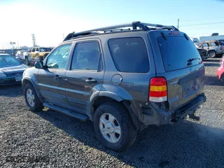 2003 Ford Escape XLT Popular 2 with VIN 1FMCU93143KB10936, listed as a IAAI auction lot 41414430 with 170,050 mi miles. Bid and sale history available at carsss.com. Image 3.