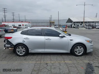 2016 Kia Optima LX with VIN KNAGT4L3XG5111796, listed as a IAAI auction lot 42106116 with 138,184 mi miles. Bid and sale history available at carsss.com. Image 13.