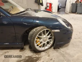 2011 Porsche 911 Turbo with VIN WP0AD2A93BS766801, listed as a IAAI auction lot 41566167 with 66,785 mi miles. Bid and sale history available at carsss.com. Image 18.